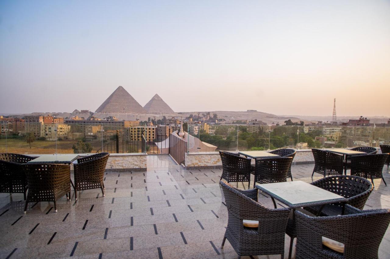 New Pyramids Eyes Hotel Caïro Buitenkant foto
